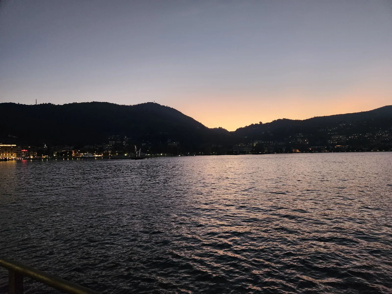 Sunset over Lake Como with the mountains in silhouette