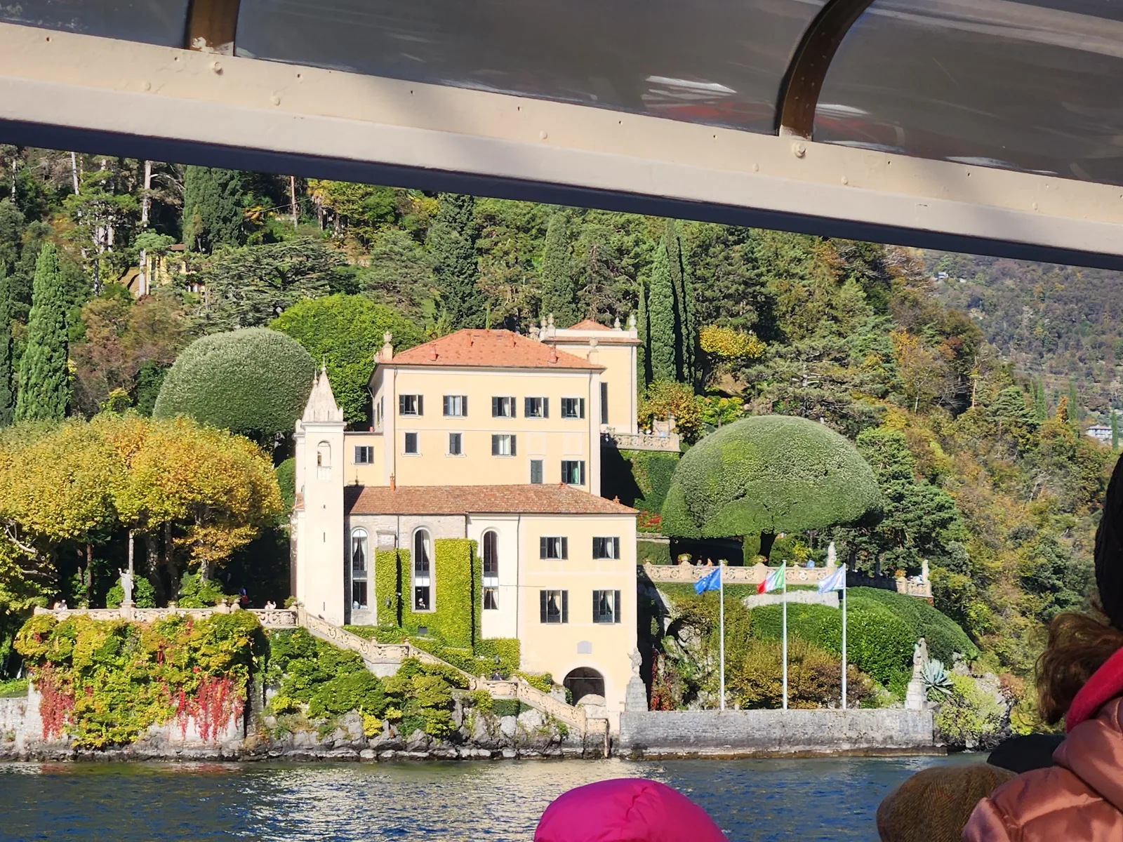 A grand villa on Lake Como seen from the ferry