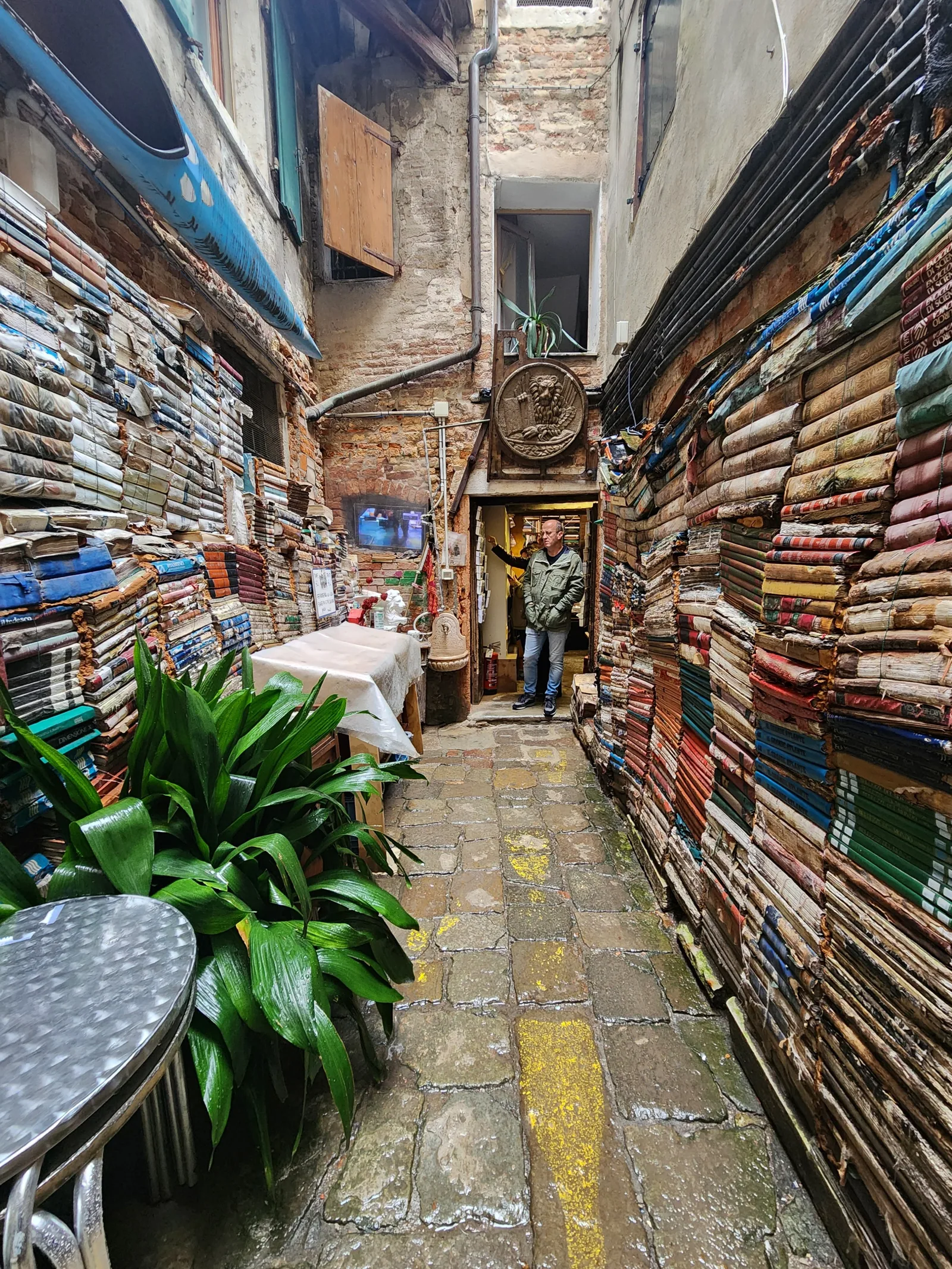 Books stacked inside a gondola at Libreria Acqua Alta in Venice