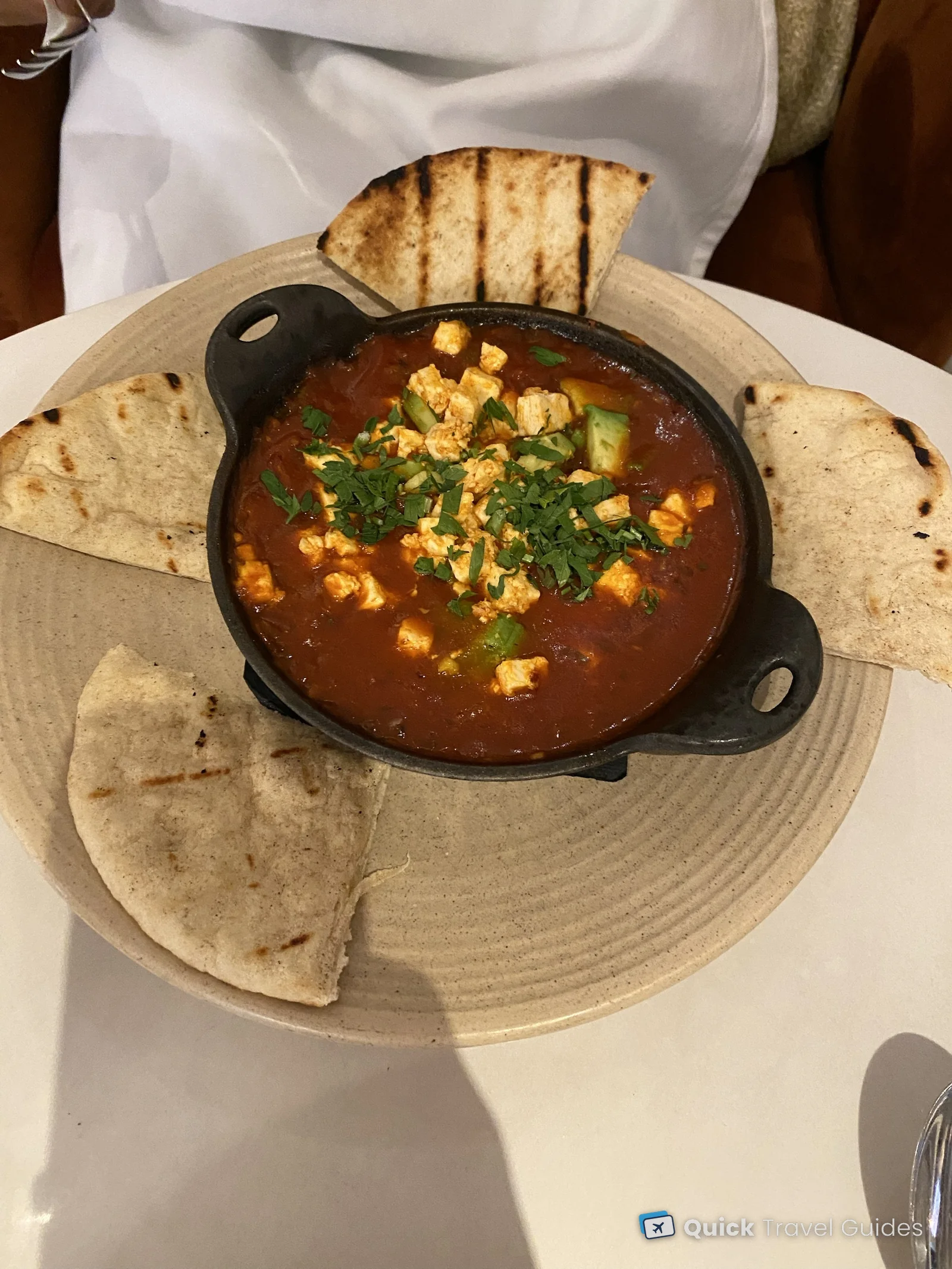 Vegetarian shakshuka with extra avocado and peppers, served with grilled pita, at the Kimpton Canary in Santa Barbara